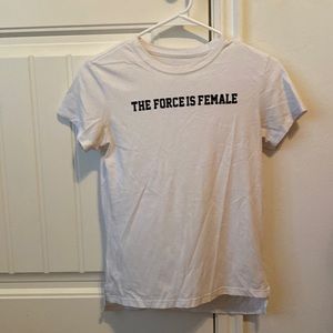 White Nike t shirt in a women’s medium. Says “Force is female” from Star Wars